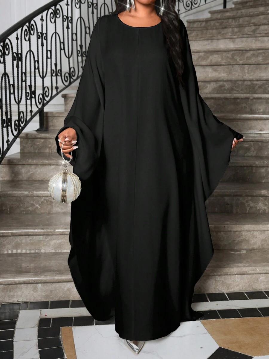 czarna sukienka oversize szerokie rękawy