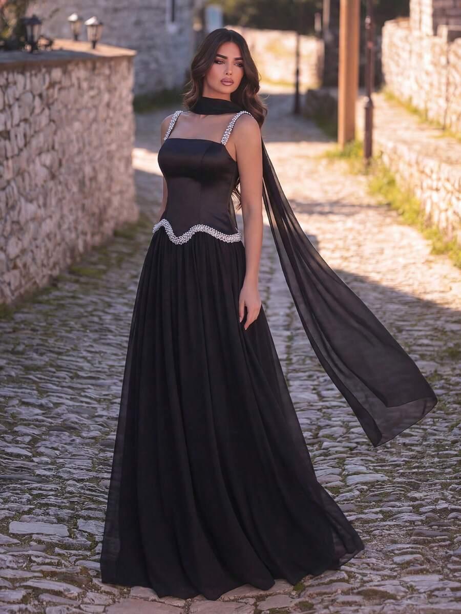 czarna maxi sukienka rozkloszowana zdobienie