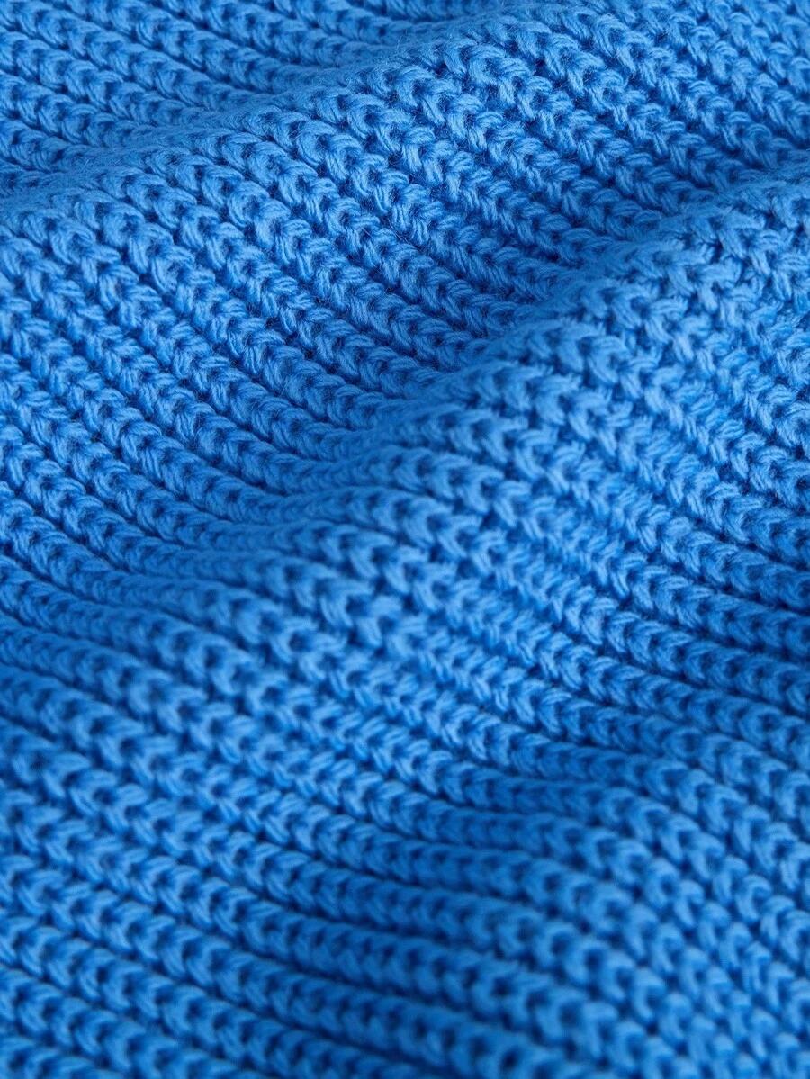 niebieski sweter v-neck