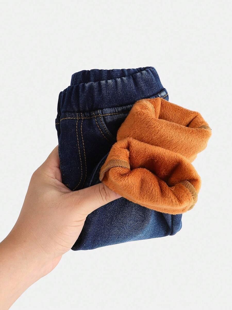 niebieskie spodnie ocieplane jeans