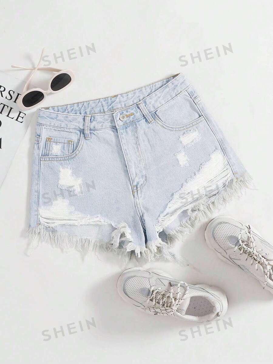 NIEBIESKIE SPODENKI JEANS PRZETARCIE 