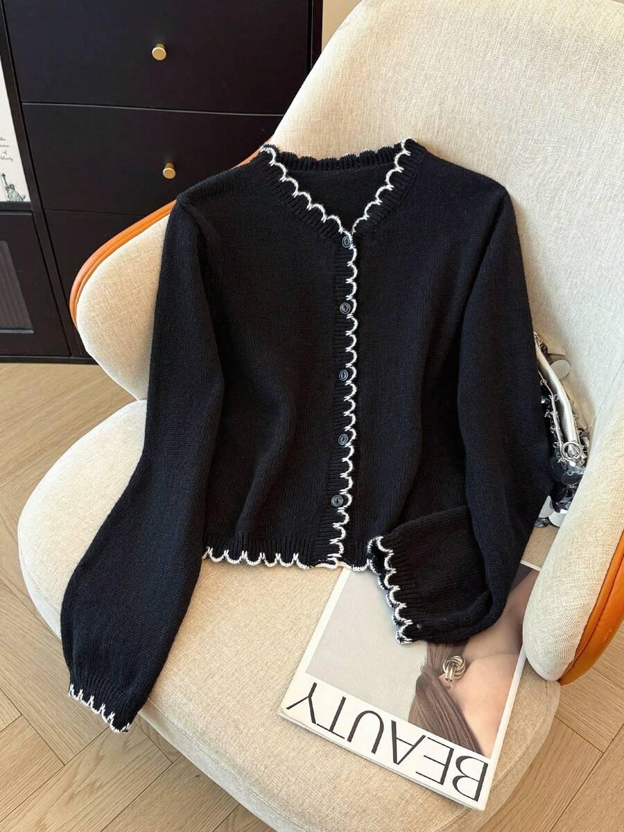 CZARNY SWETER GUZIKI