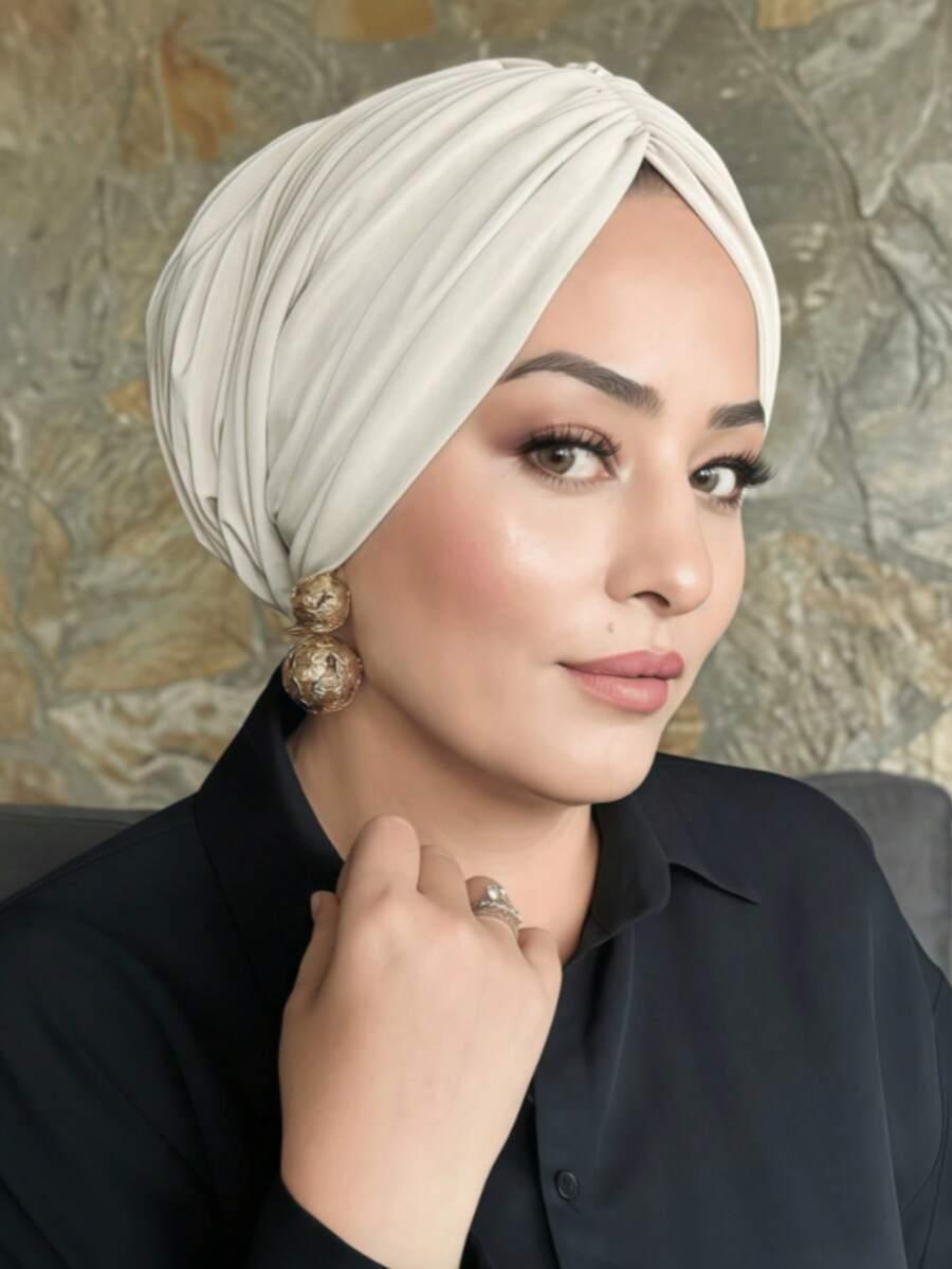beżowy turban na głowę