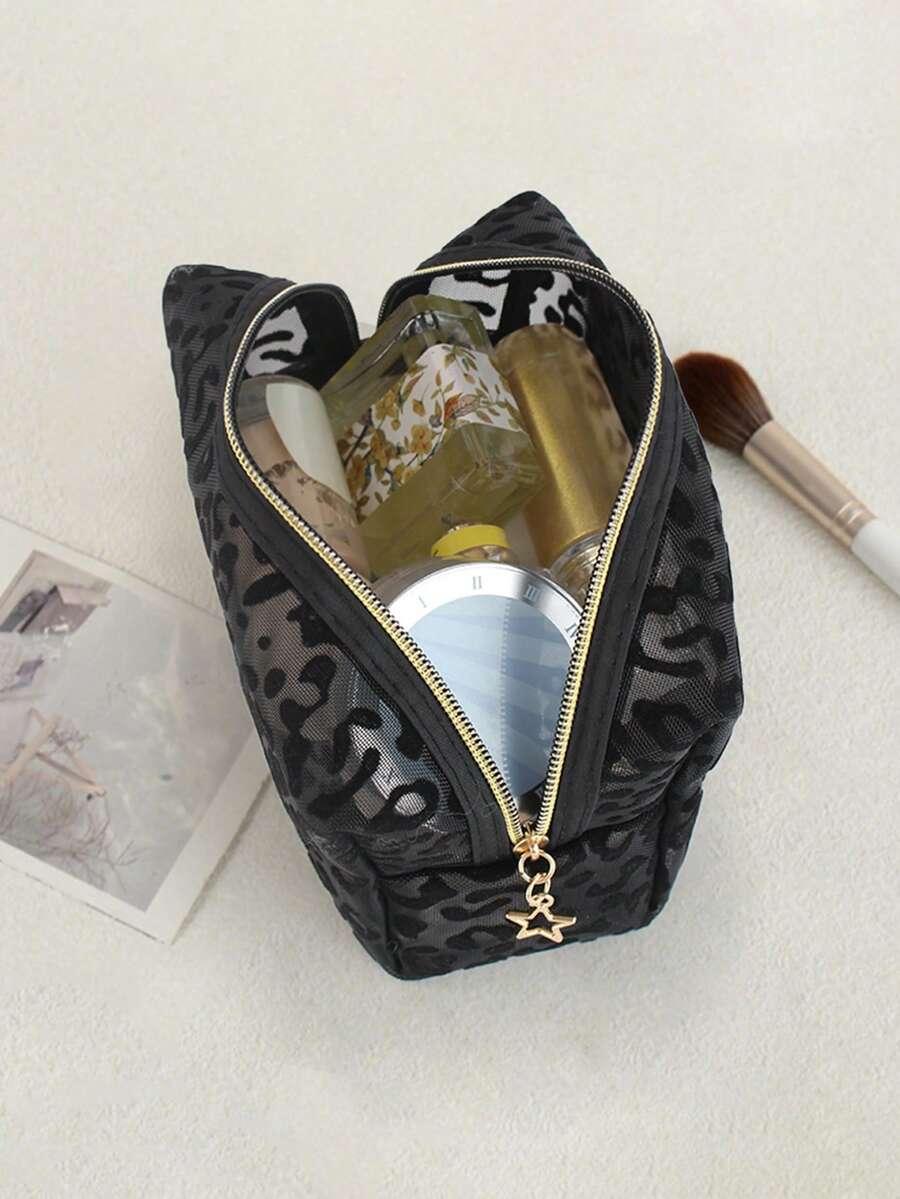 czarna kosmetyczka animal print