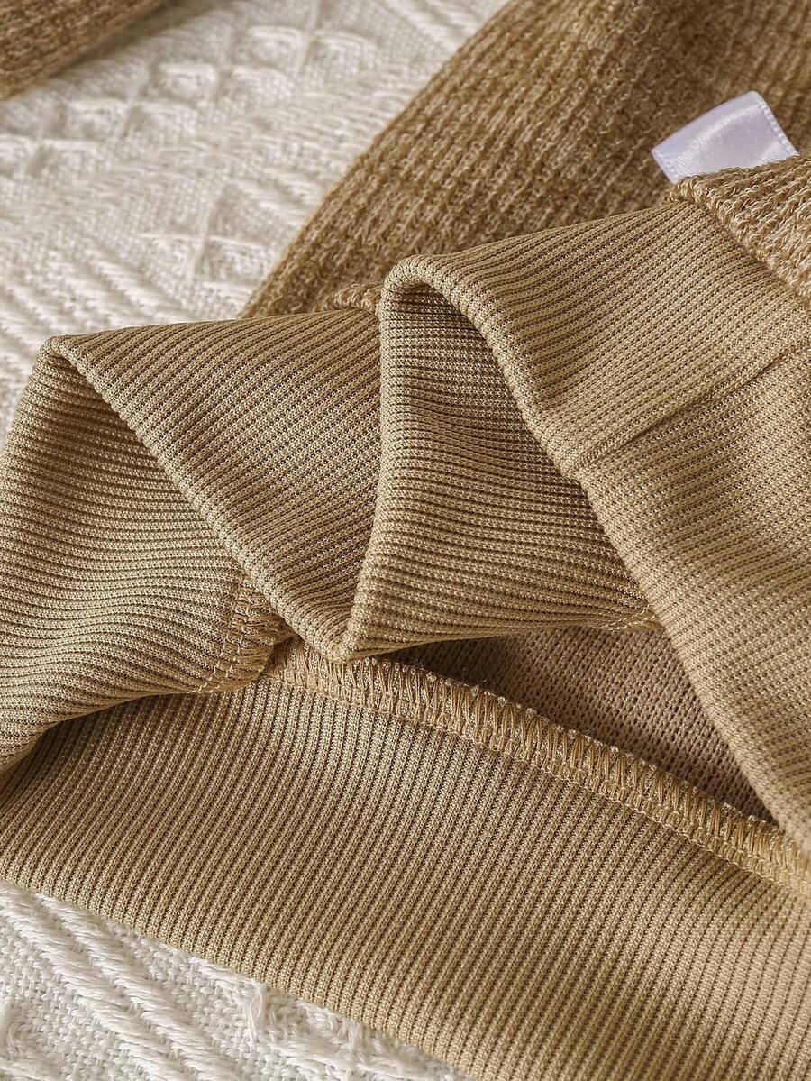komplet sweter spodnie