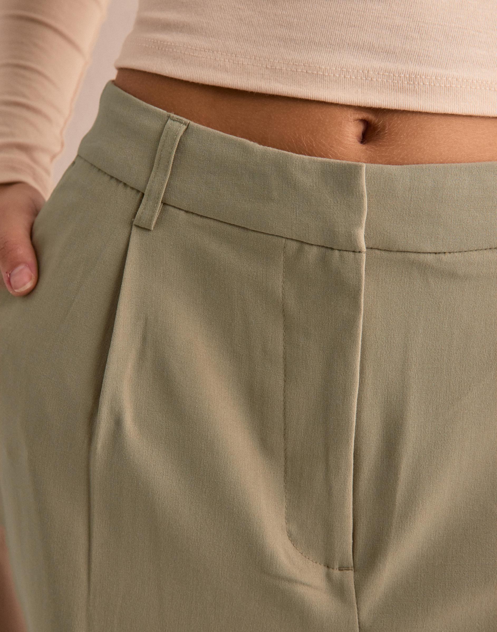 beżowe spodnie baggy kieszenie casual zamek