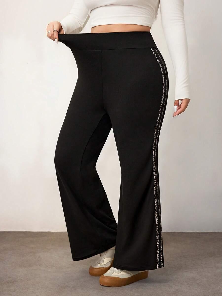 CZARNE SPODNIE DRESOWE animal print