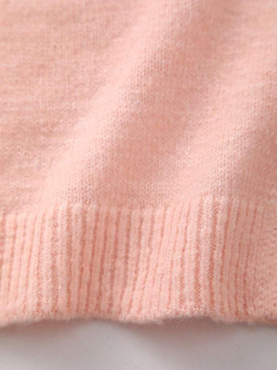 różowy sweter okrągły dekolt guziki