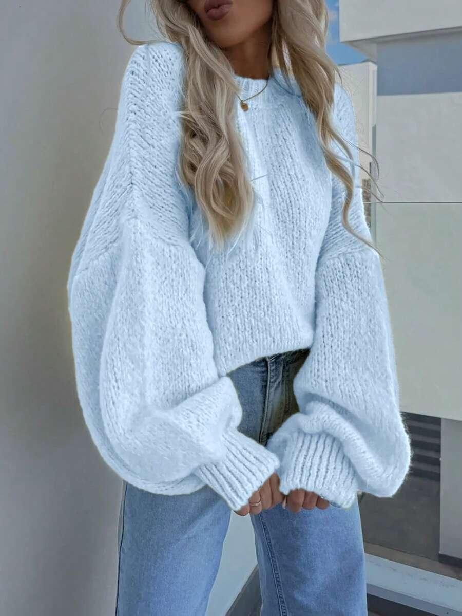 NIEBIESKI SWETER Z DOMIESZKĄ WEŁNY 