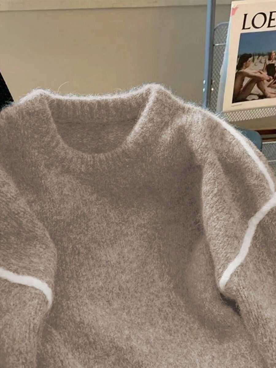 beżowy sweter z domieszką wełny
