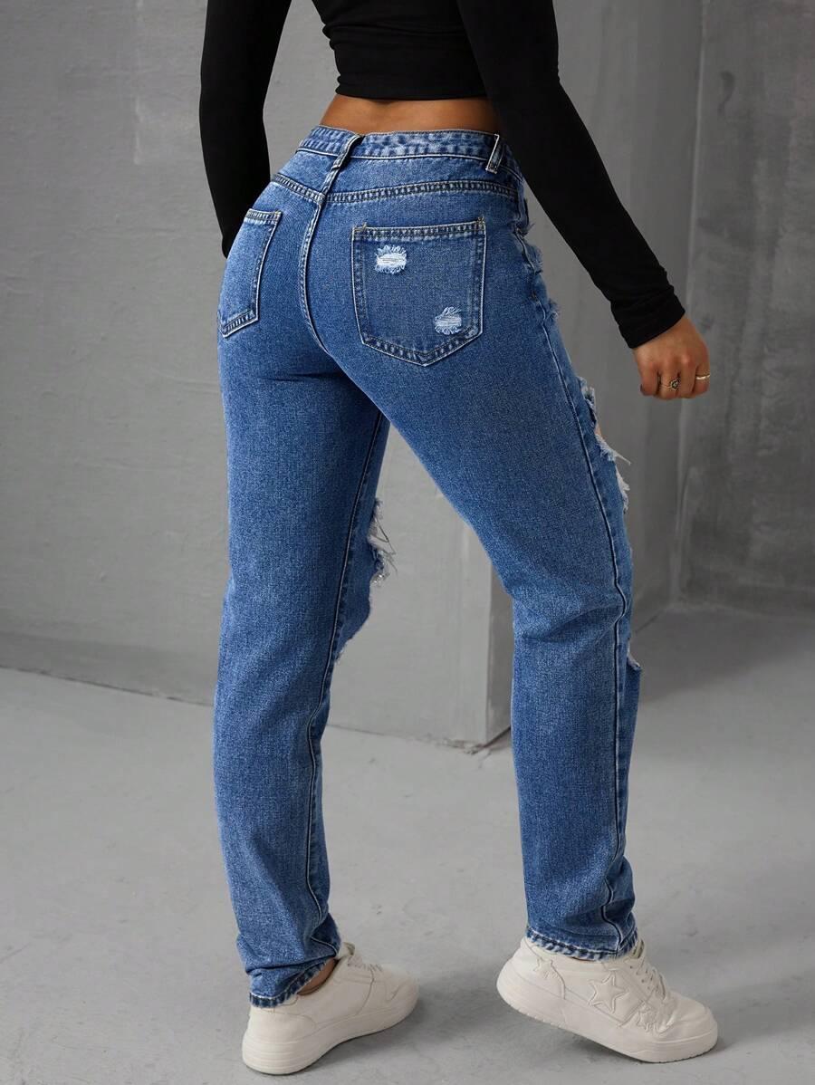 SPODNIE JEANS PRZETARCIA 