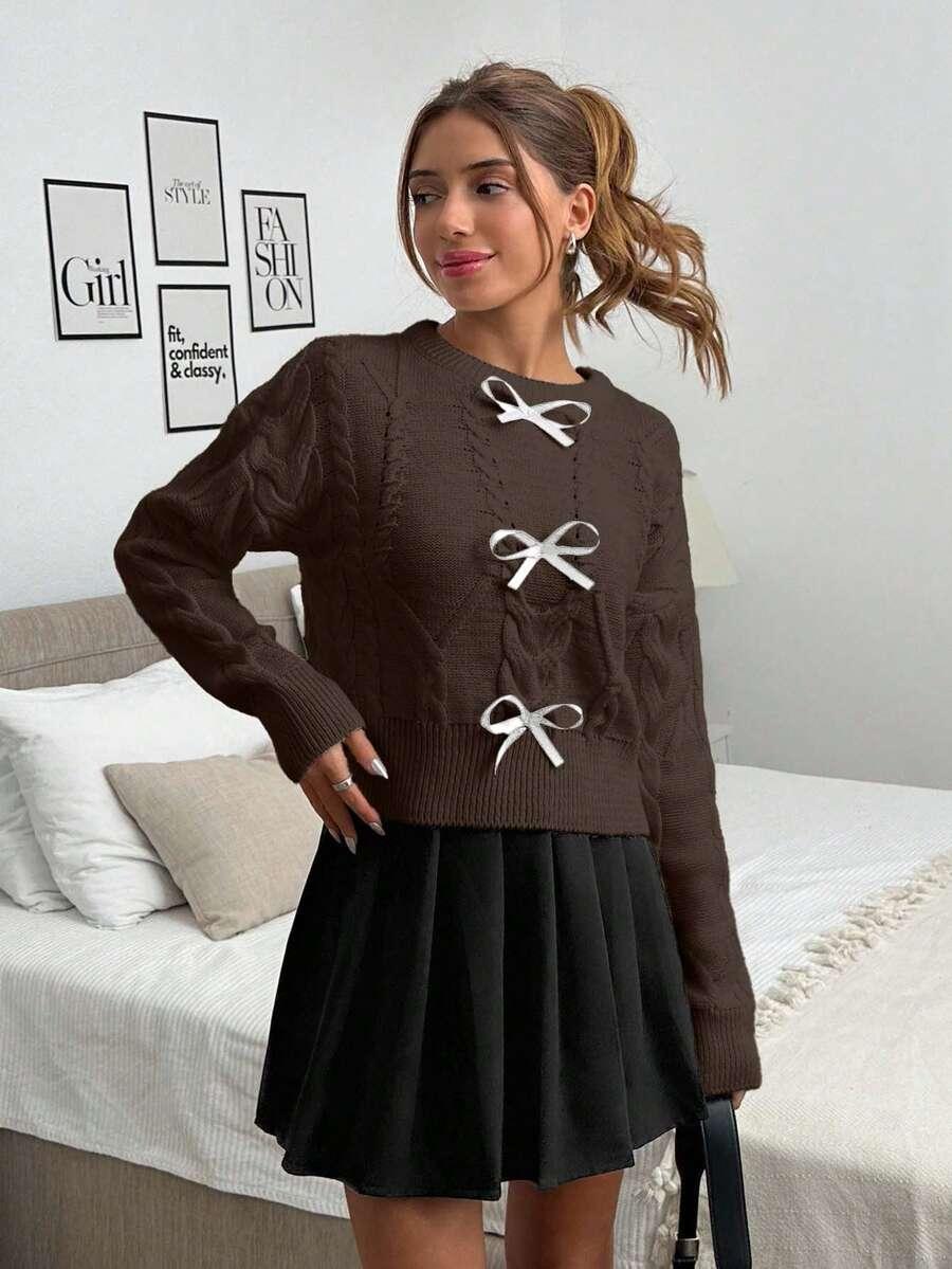 brązowy sweter kokardy