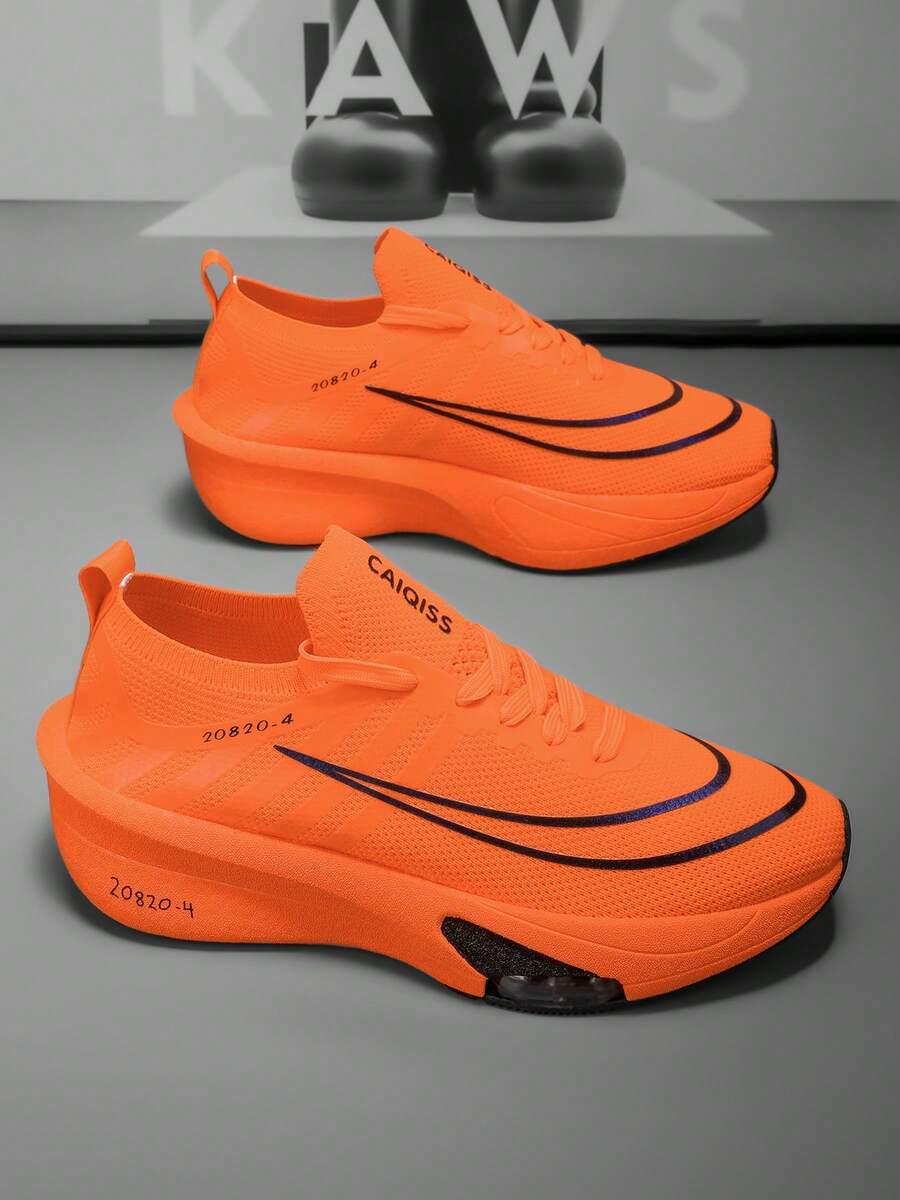 pomarańczowe buty sportowe