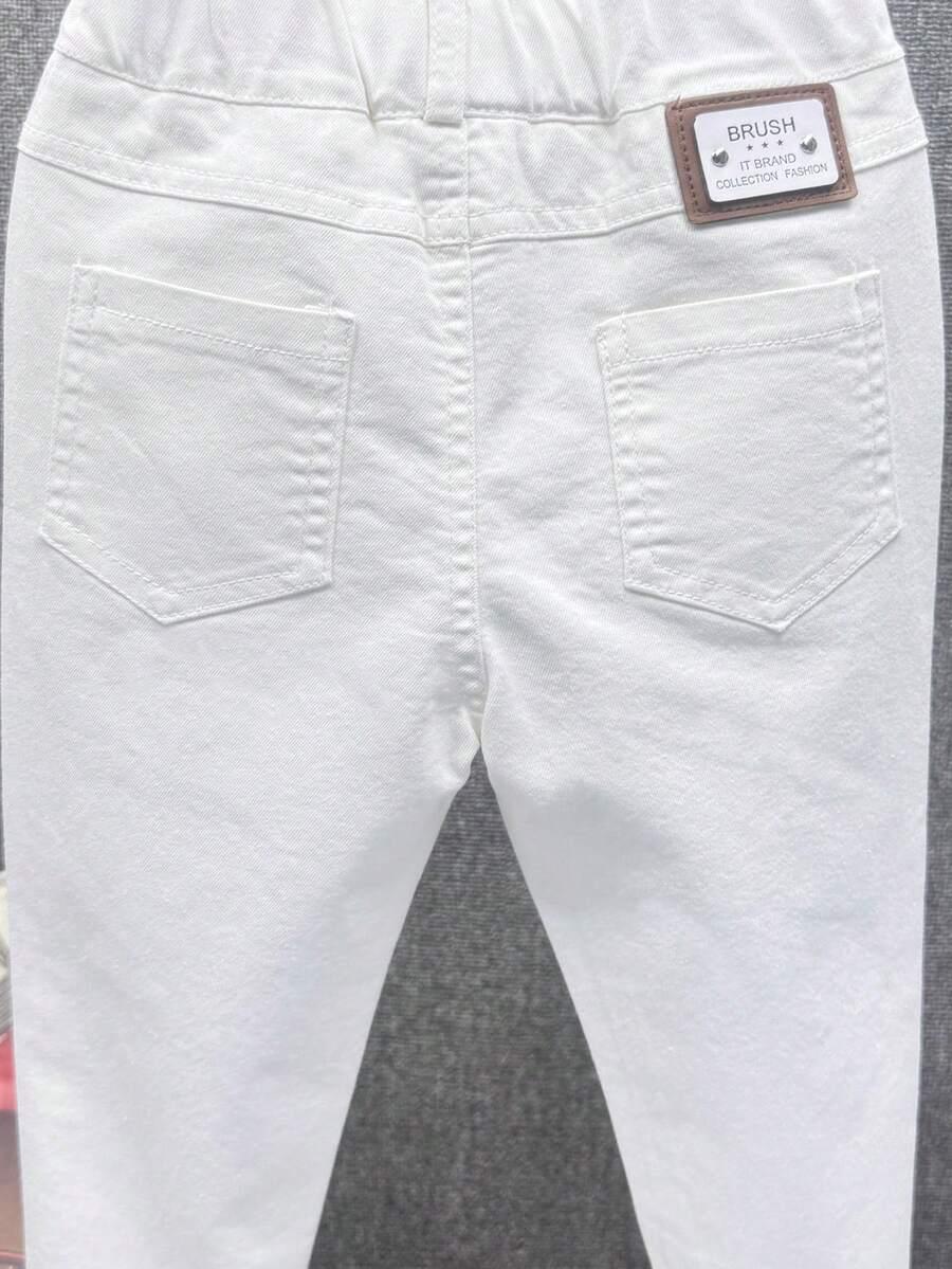 BIAŁE SPODNIE JEANS