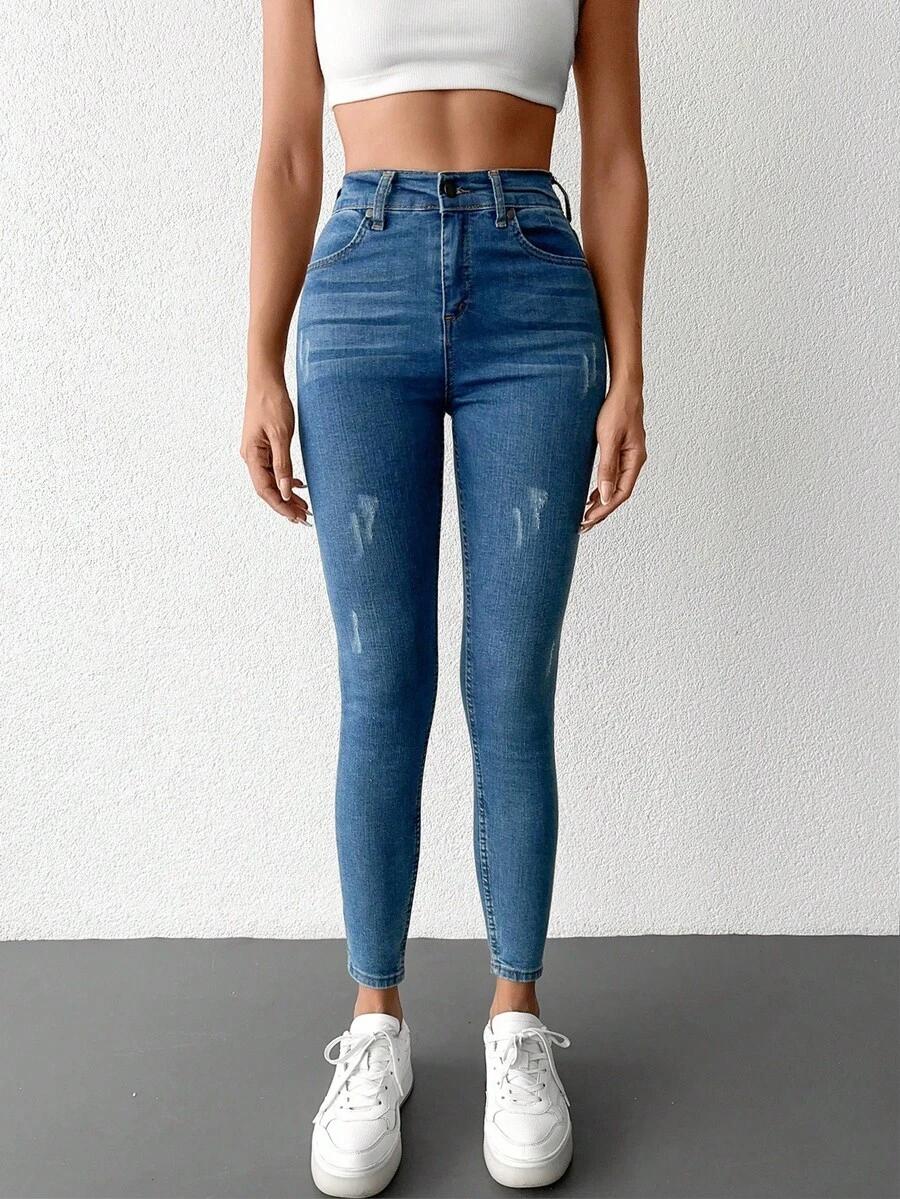 niebieskie spodnie jeans rurki ripped