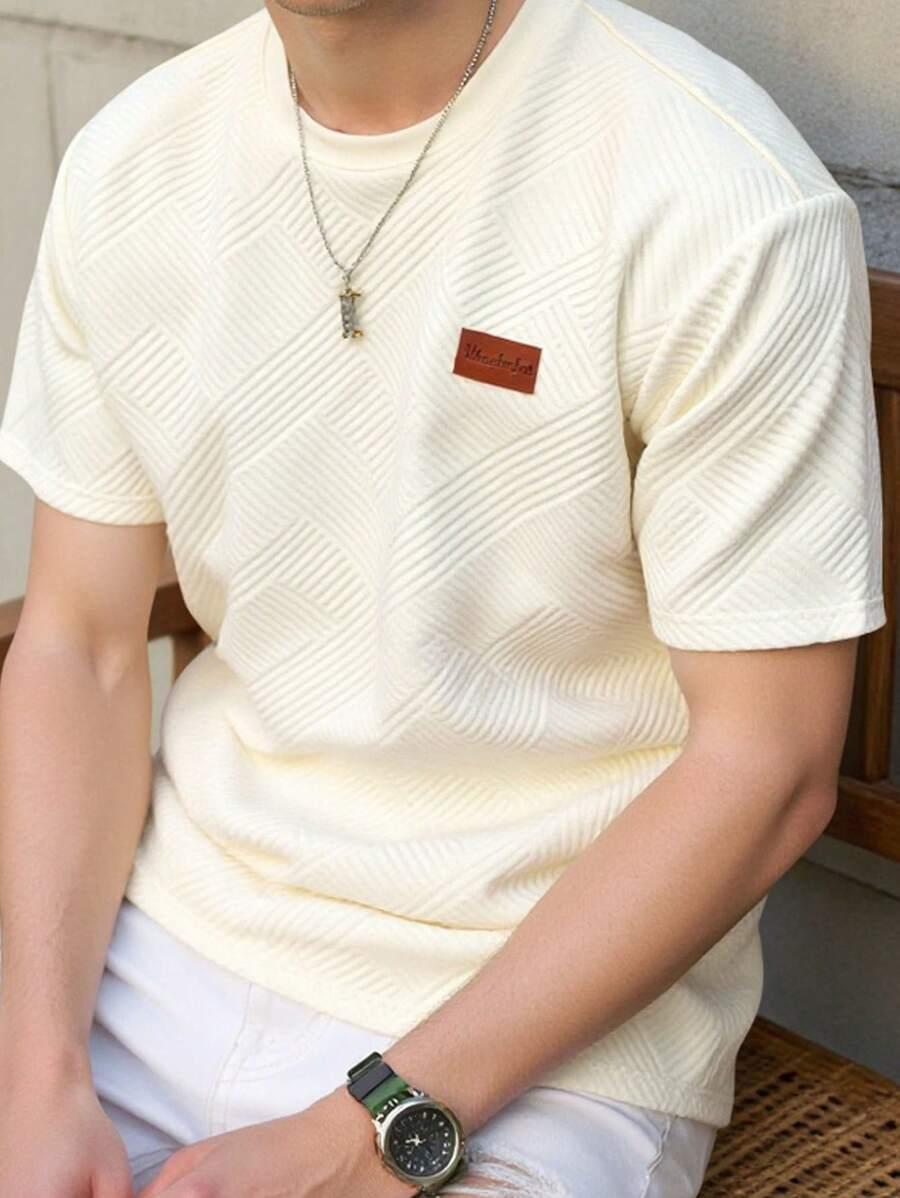 BEŻOWY T-SHIRT Z NASZYWKĄ