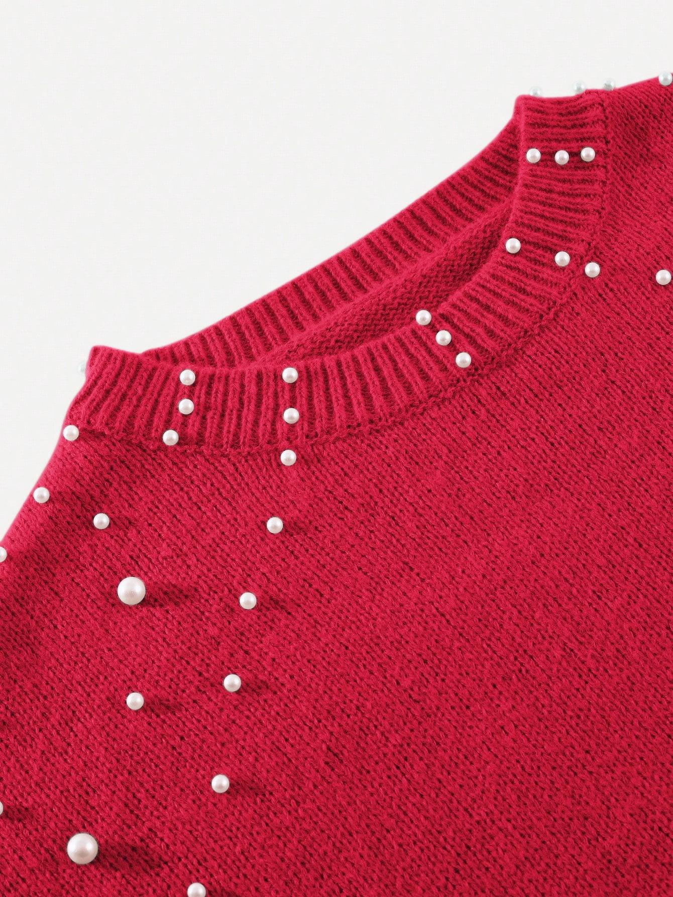 czerwony sweter zdobienie