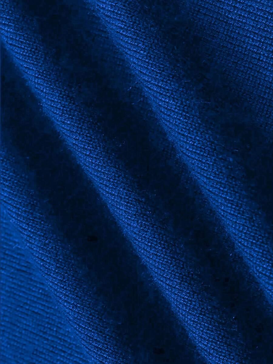 niebieski sweter golf