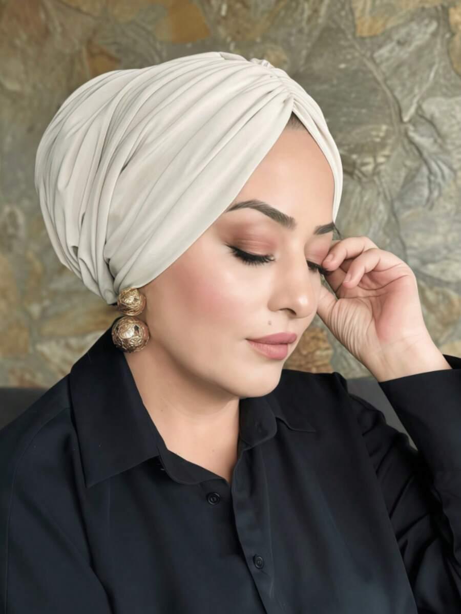 beżowy turban na głowę
