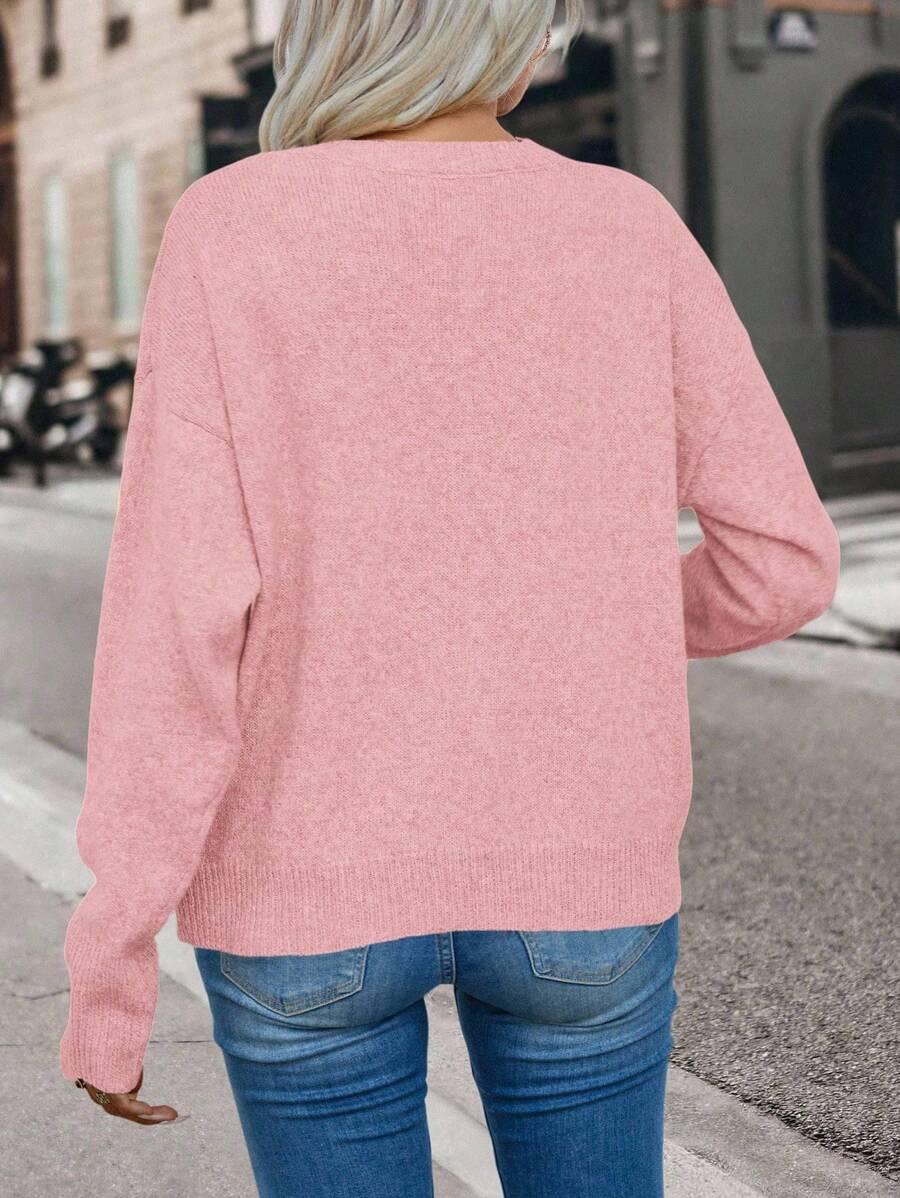 różowy sweter okrągły dekolt 