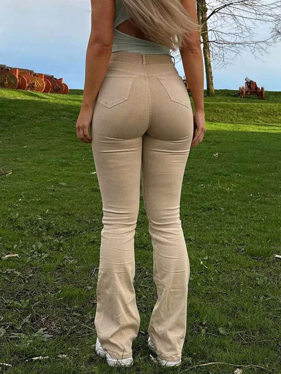 beżowe spodnie jeans dzwony