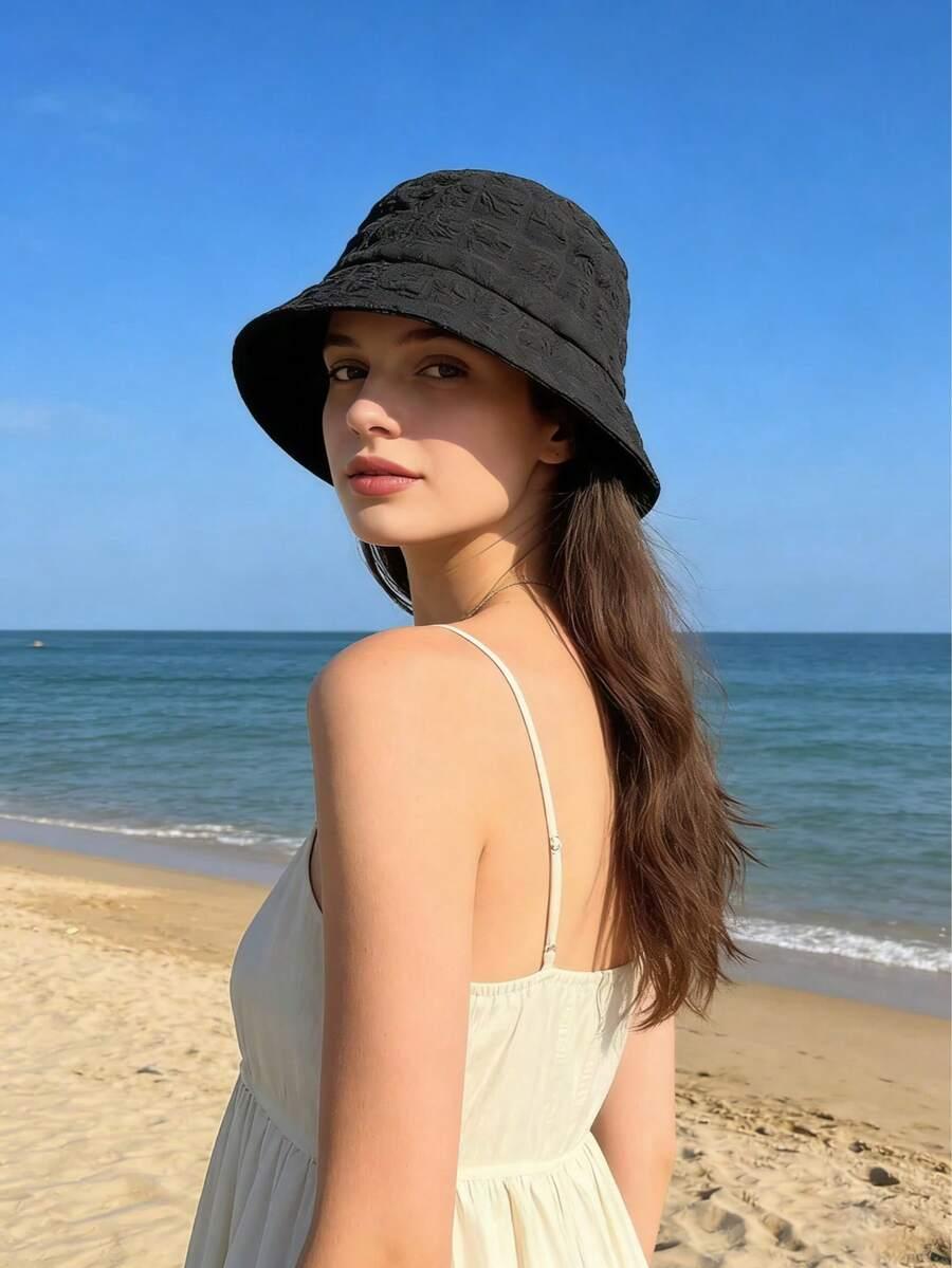 czarna czapka bucket