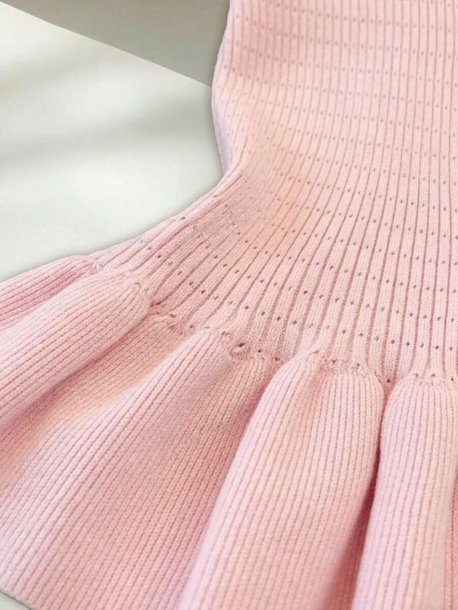 różowy dzianinowy sweter