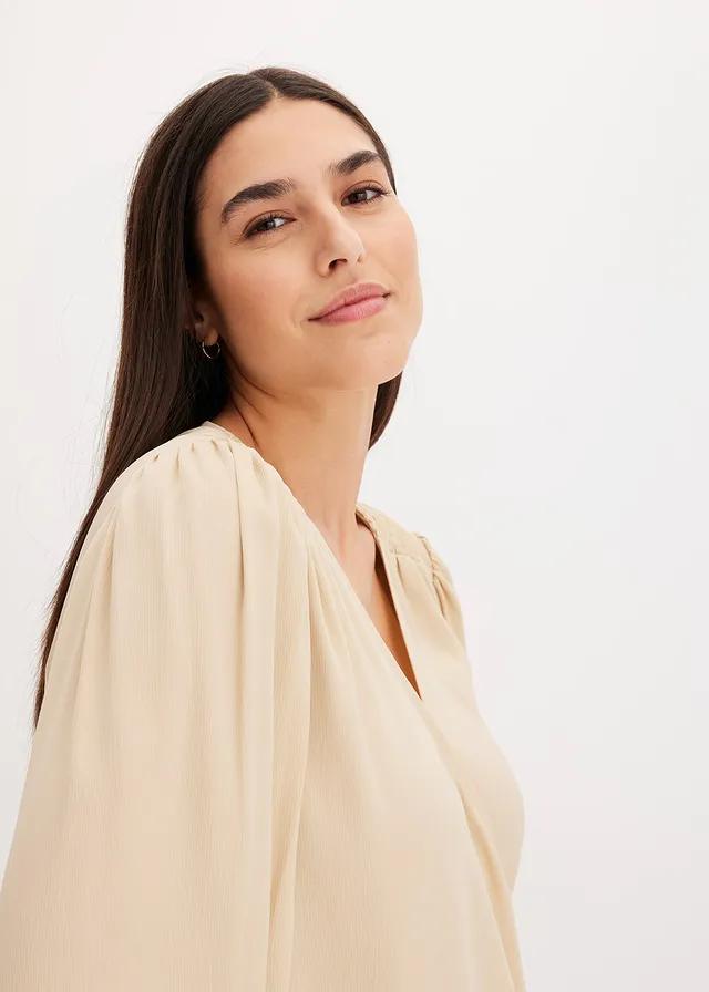beżowa bluzka v-neck