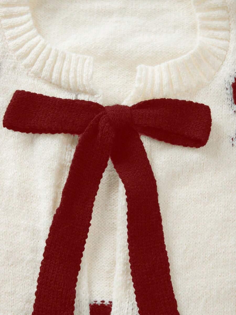 sweter długi rękaw wiązanie wzór kokardy
