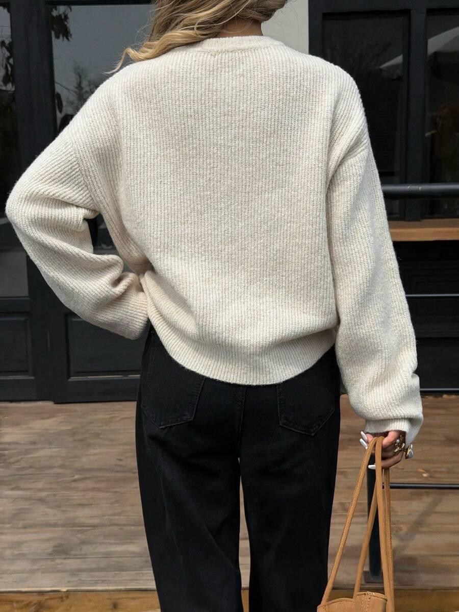 BEŻOWY SWETER GUZIKI