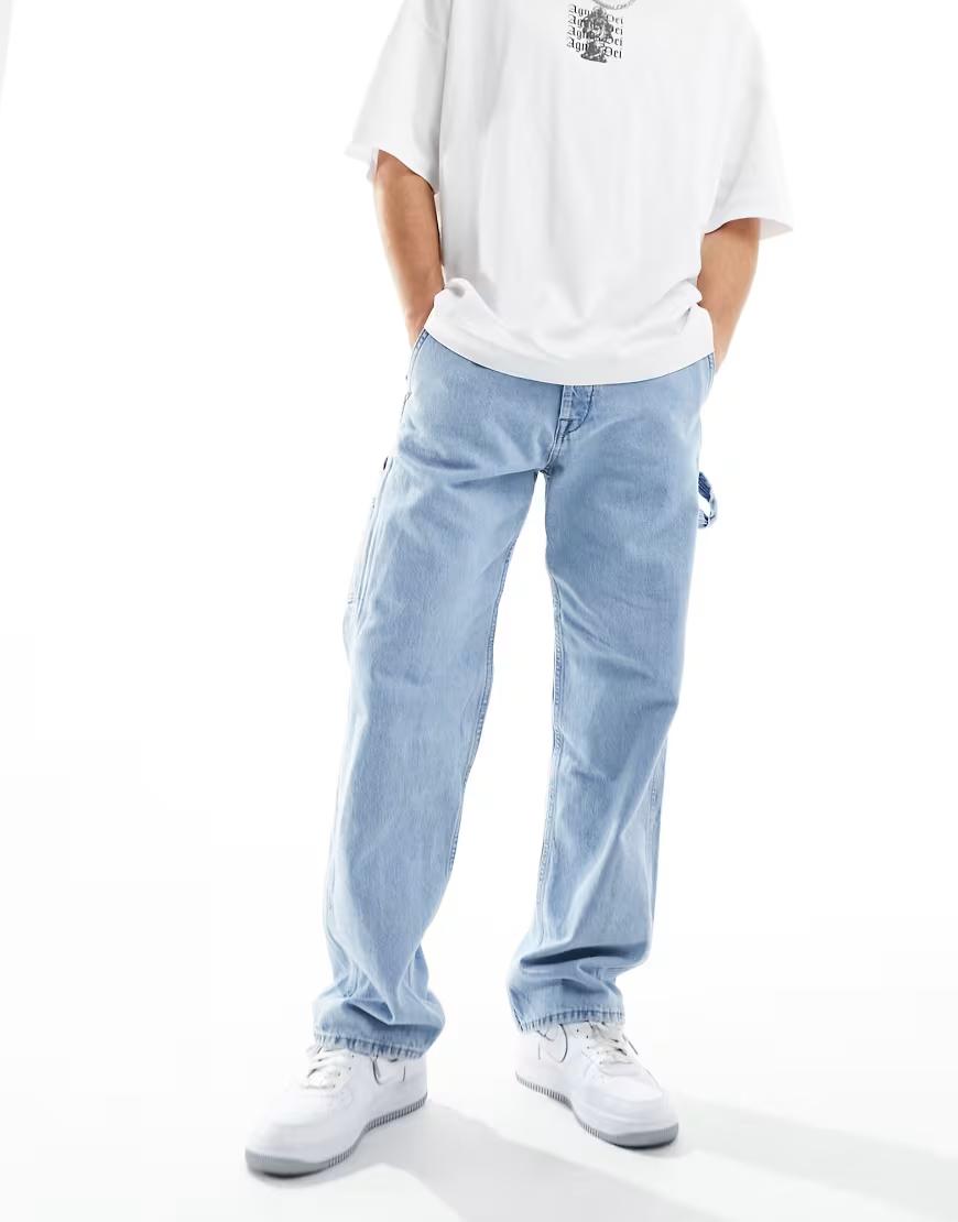 niebieskie spodnie jeans kieszenie