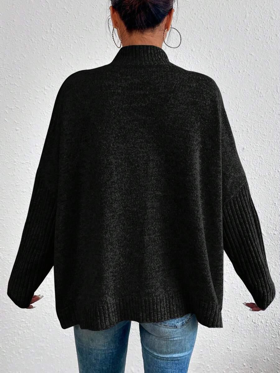 CZARNY LUŹNY SWETER