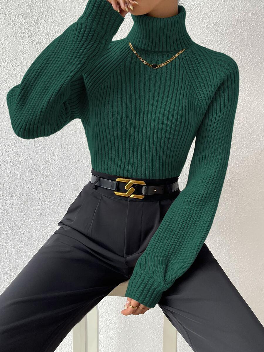 PRĄŻKOWANY SWETER GOLF 