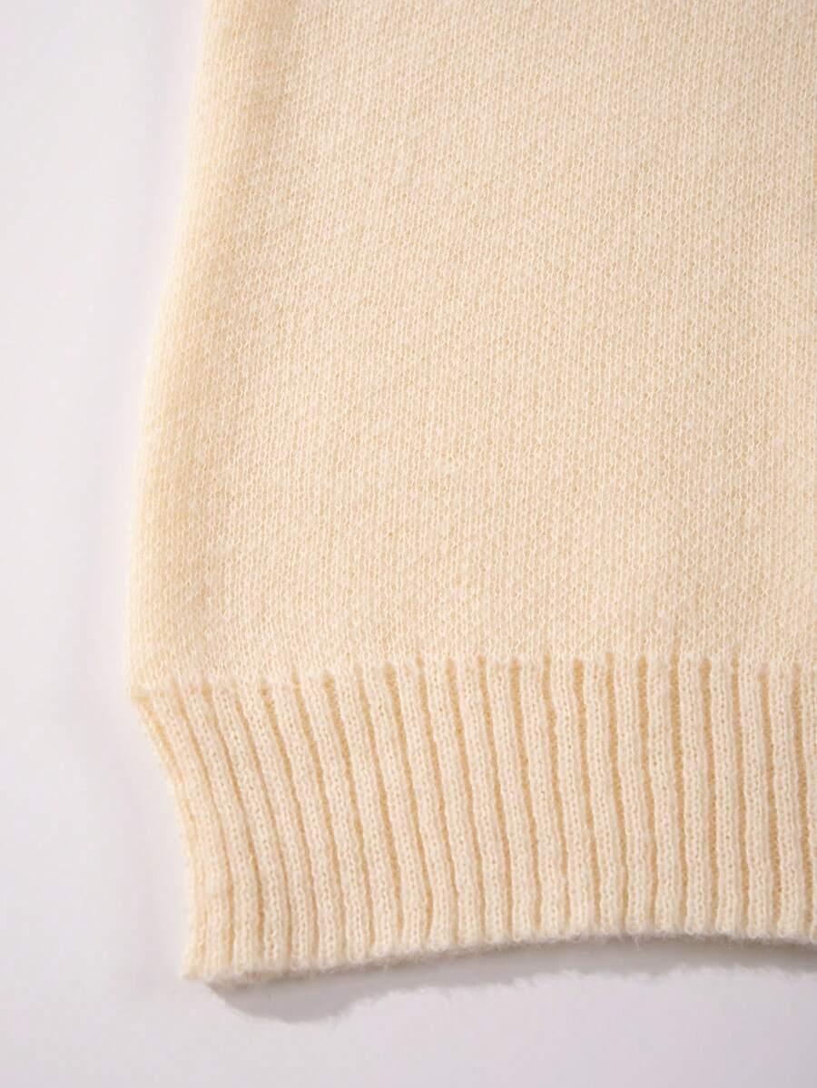 beżowy sweter okrągły dekolt