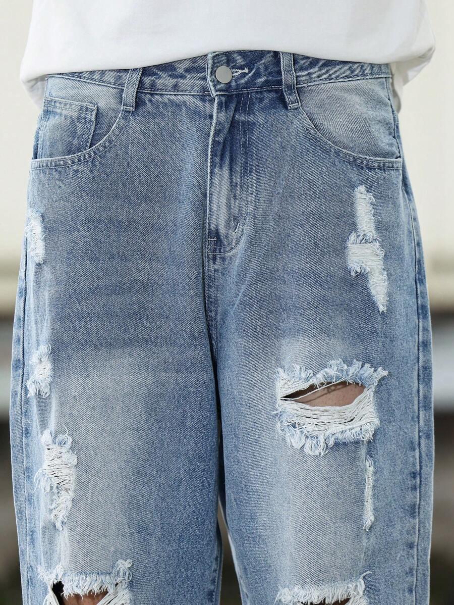 niebieskie spodnie jeans