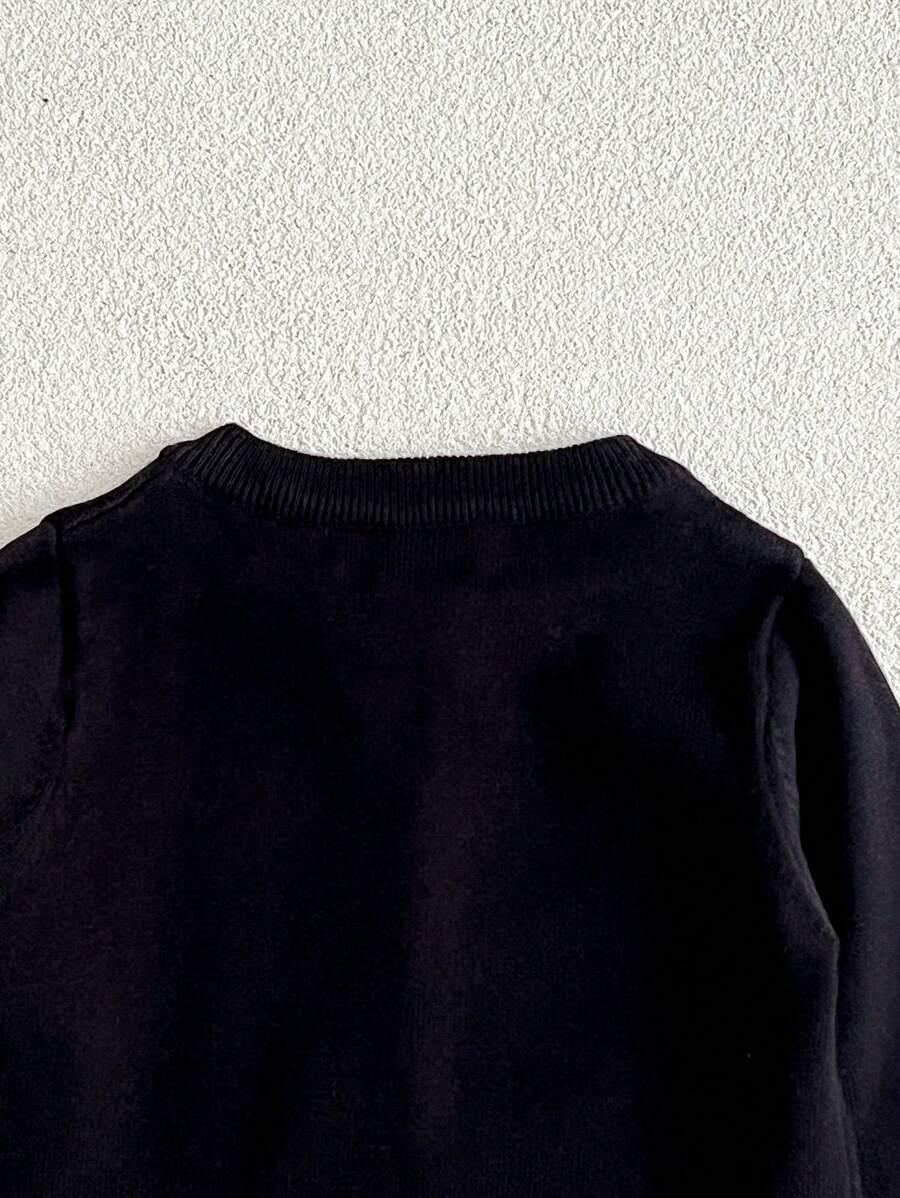 CZARNY SWETER GUZIKI