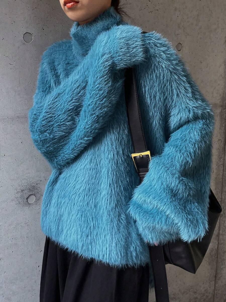 niebieski sweter miś
