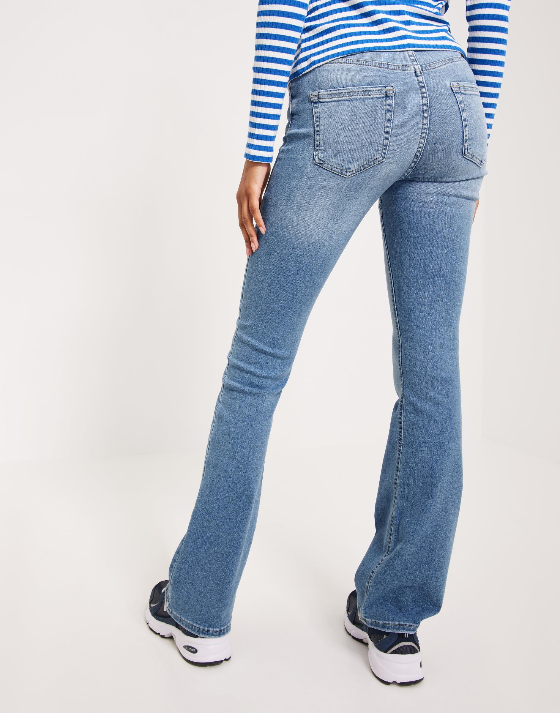 NIEBIESKIE SPODNIE JEANSOWE DZWONY