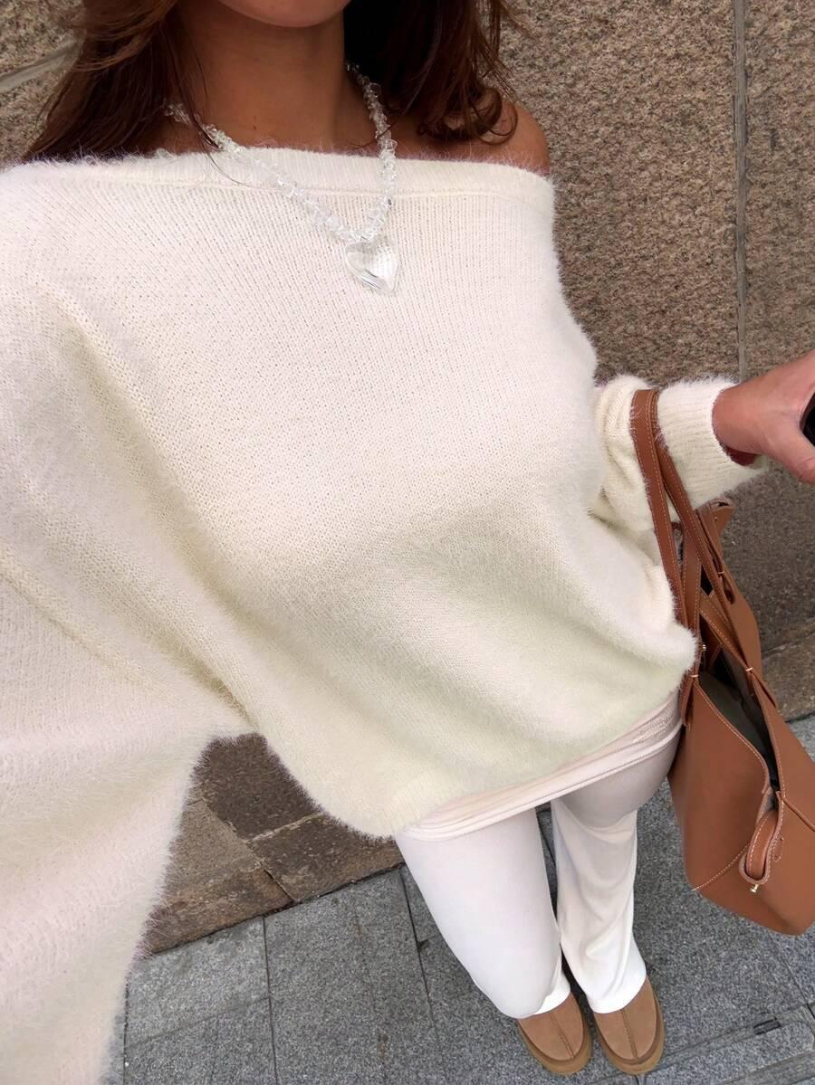 kremowy dzianinowy sweter 