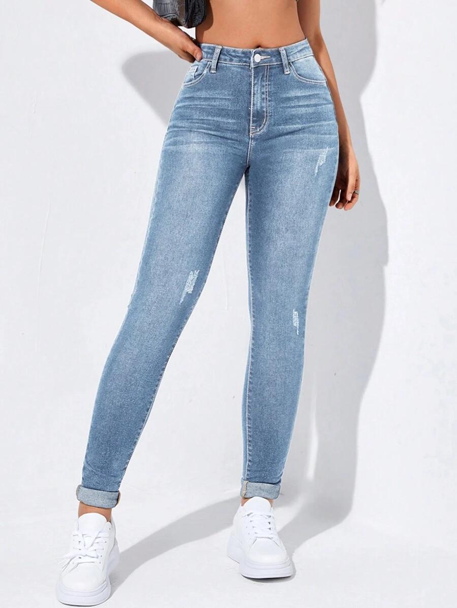 NIEBIESKIE SPODNIE JEANS PRZETARCIA