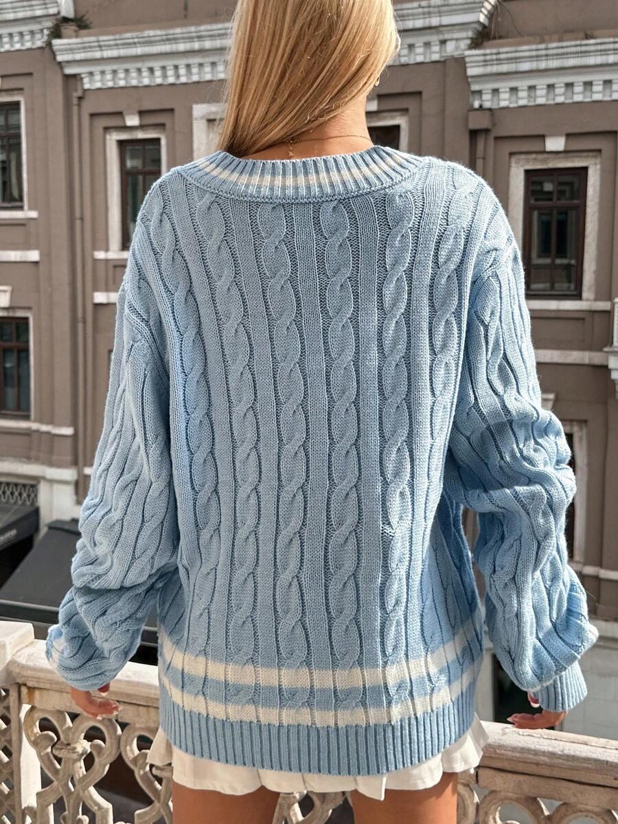 niebieski sweter v-neck