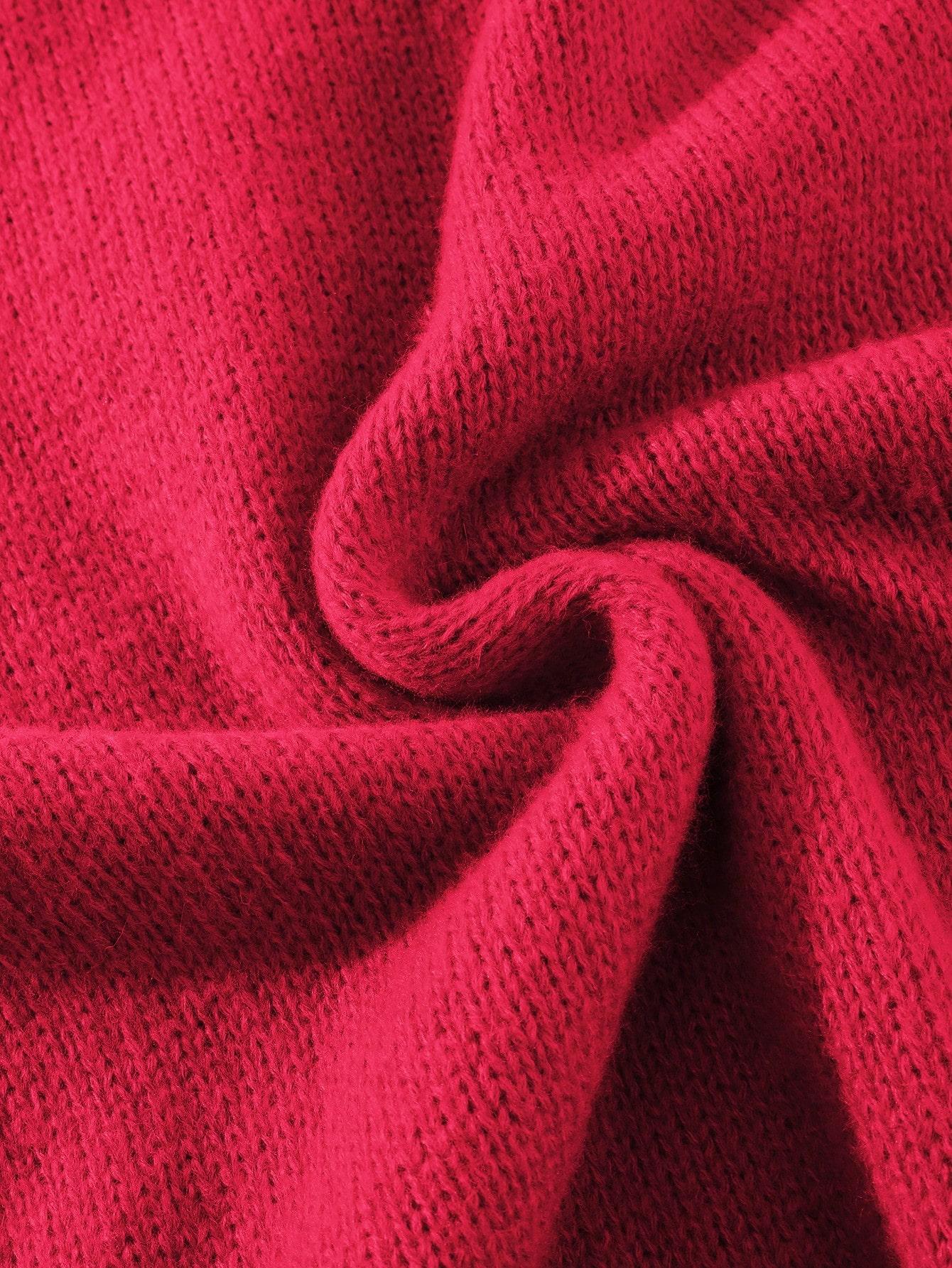 czerwony sweter zdobienie