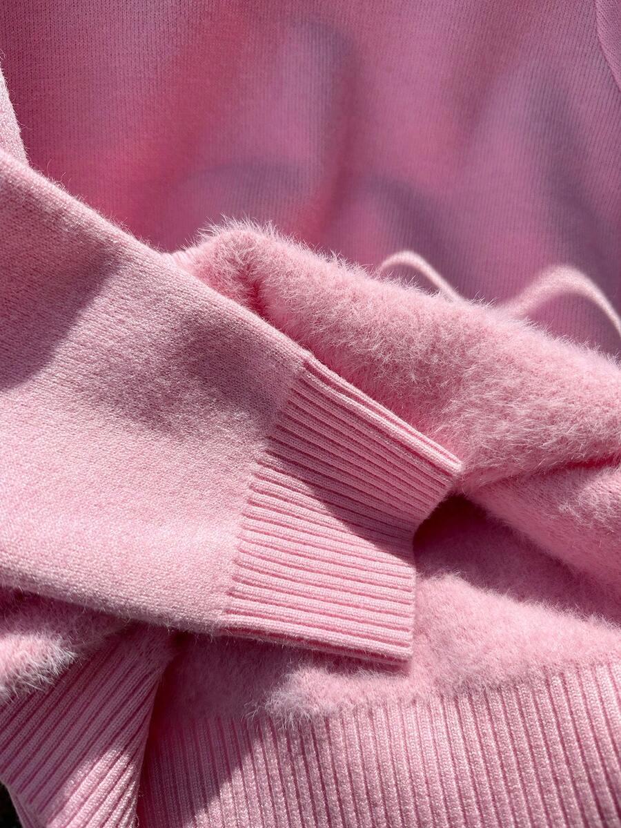 różowy sweter okrągły dekolt