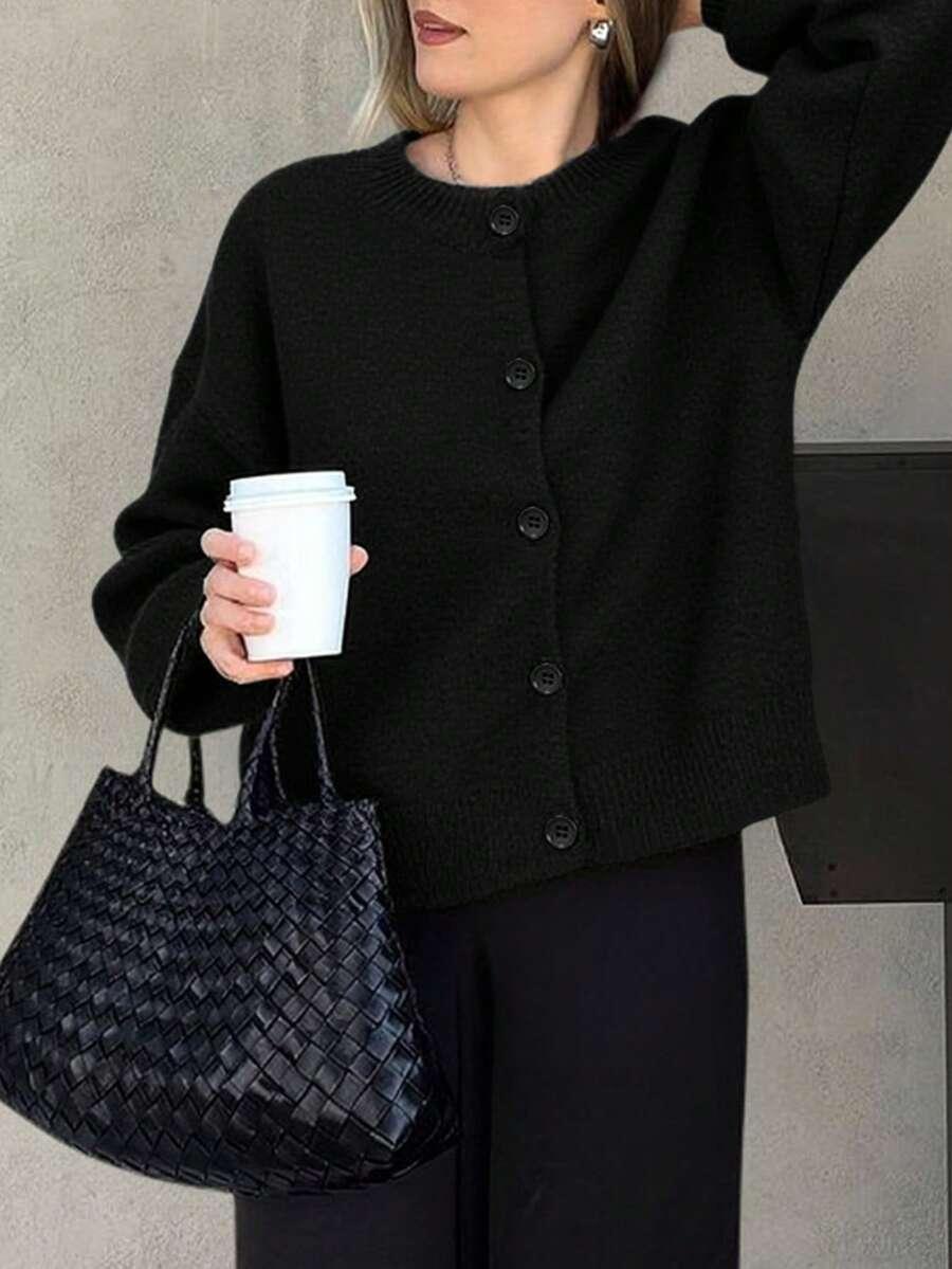 CZARNY SWETER GUZIKI