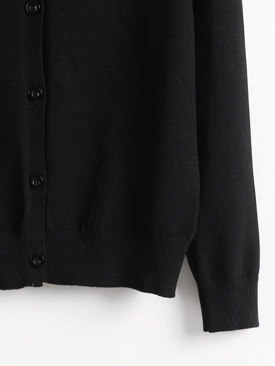 czarny sweter guziki