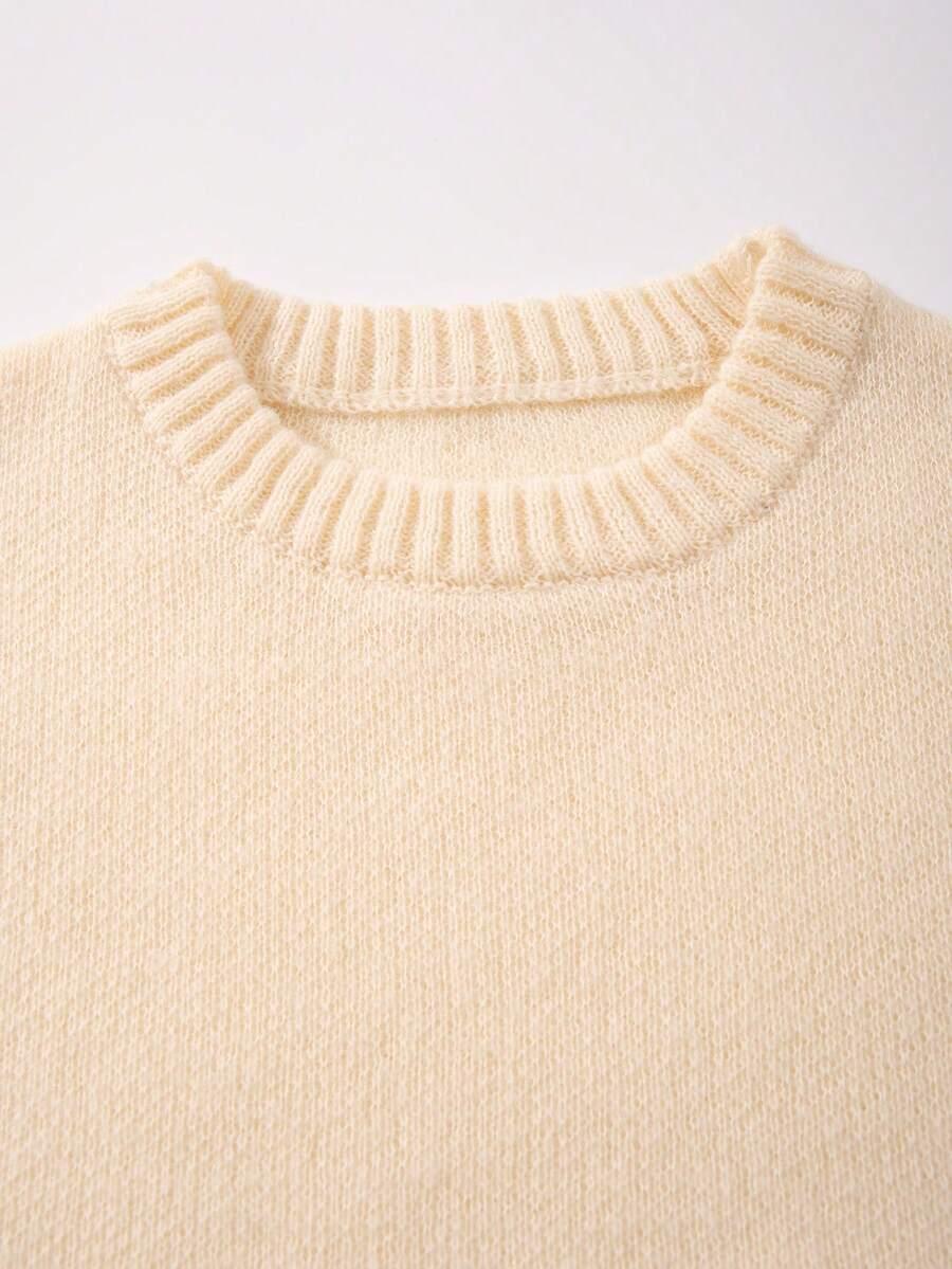 beżowy sweter okrągły dekolt