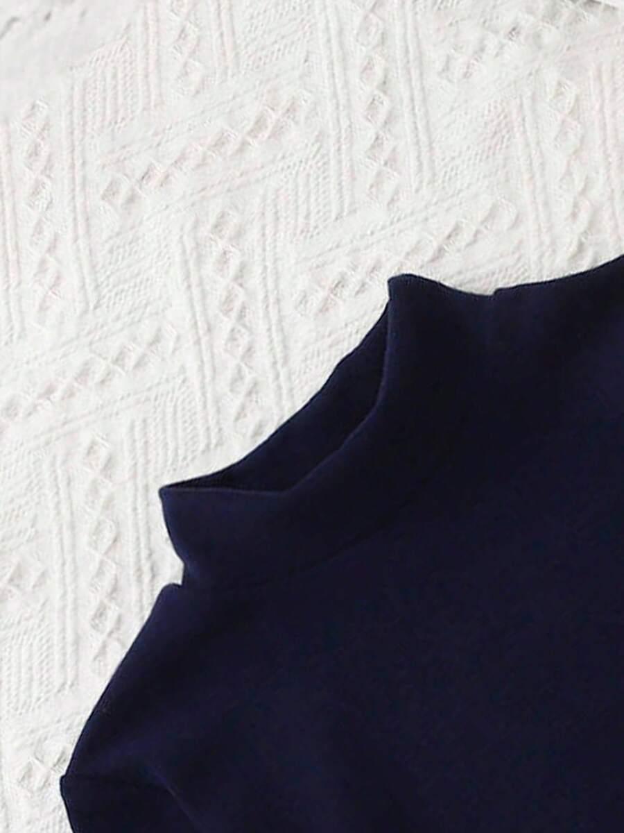 granatowy sweter półgolf