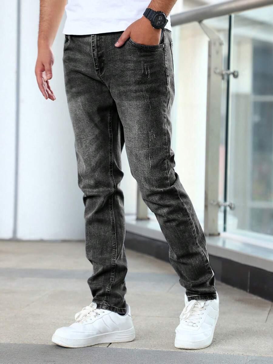 ZWĘŻANE SPODNIE JEANS