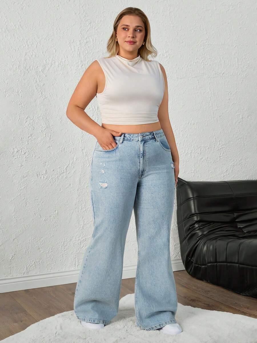 niebieskie spodnie jeans przetarcia 