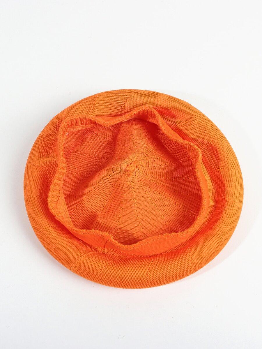 pomarańczowy beret listek